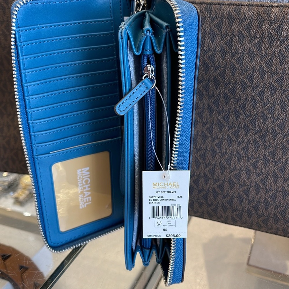 MICHAEL KORS
Leather Continental Wristlet Phone Case Wallet 
Teal
NWT - Picture 10 of 16